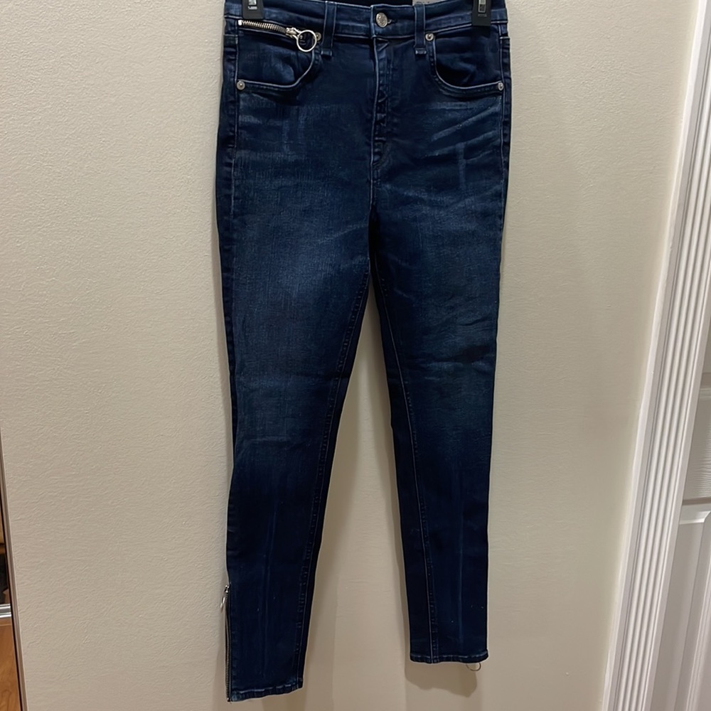 Rag & Bone skinny blue jeans with zipper waist pocket and zip up/down ankles.